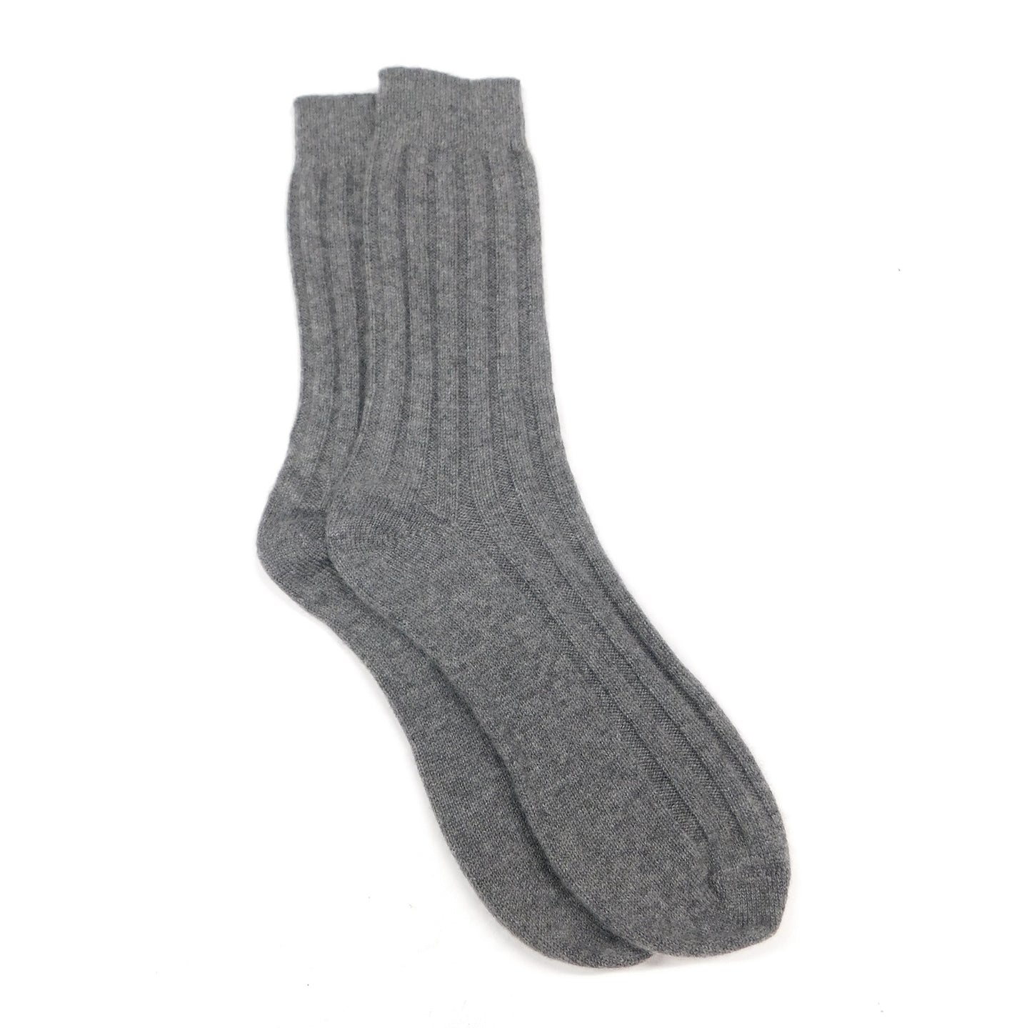 Pair of mens grey bed socks on a white background