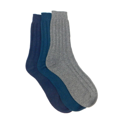 Three pairs of socks in blue and gray on a white background