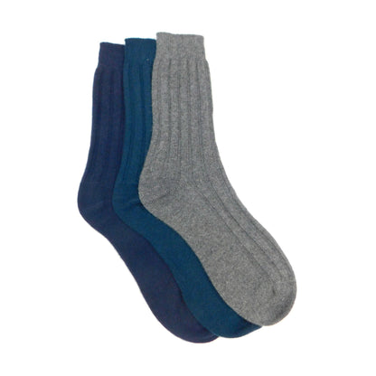 Three pairs of socks in blue and gray on a white background
