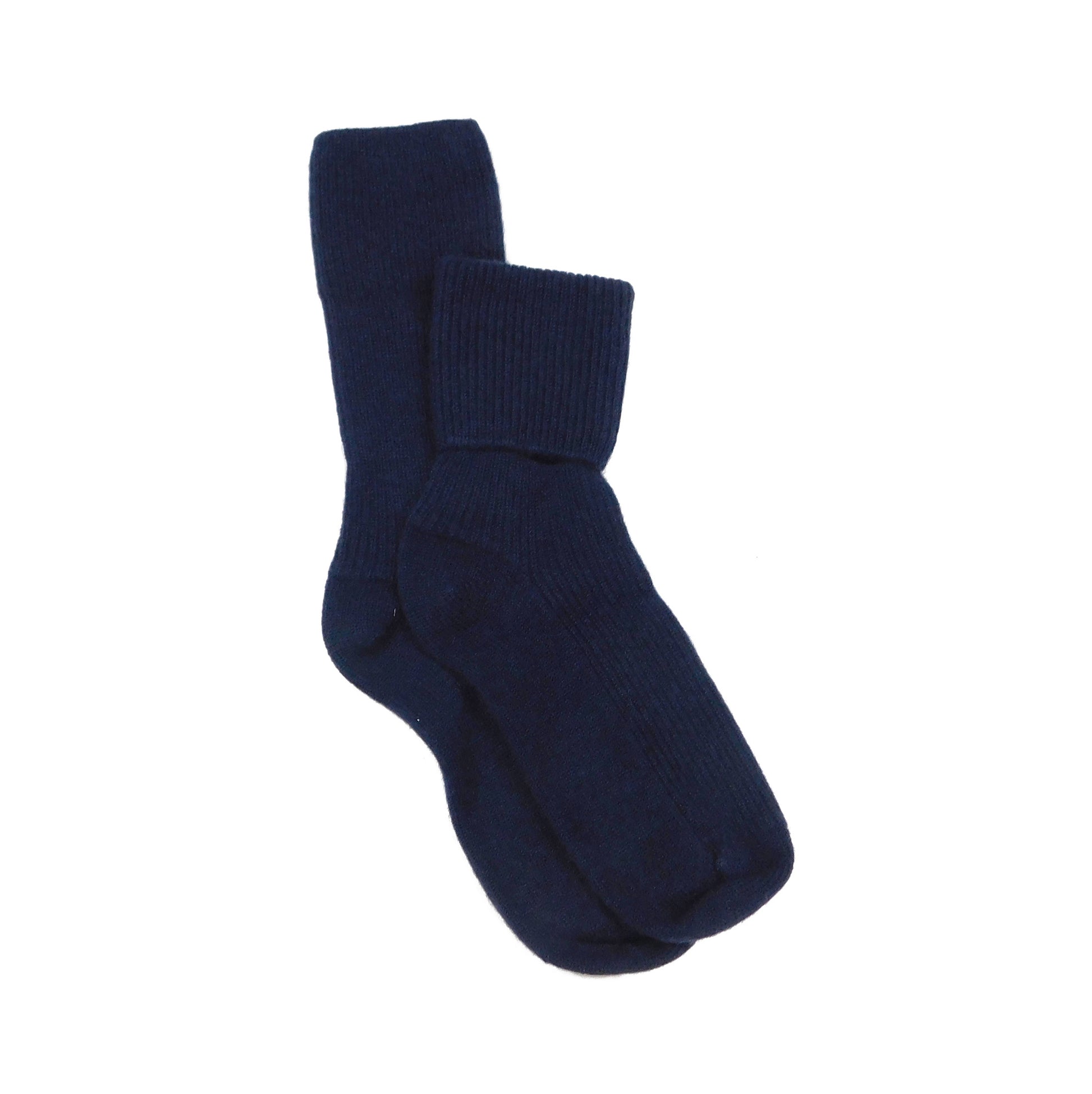 Pair of Navy blue cashmere bed socks on a white background